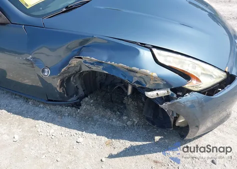 2009 Nissan 370Z Touring z USA, uszkodzony, nr VIN JN1AZ44E09M403640